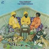 Album cover art for Soul Symphony's 'A New Sound From The Three Sounds', featuring three men in raincoats seated in a boat with zebras, lions, kangaroos, and other animals gathered around a jukebox against a light blue sky.
