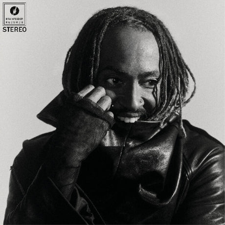 Black and white album cover with a phote of Thundercat wearing a leather jacket and holding a phone to their ear, featuring Brainfeeder Music Records logo.