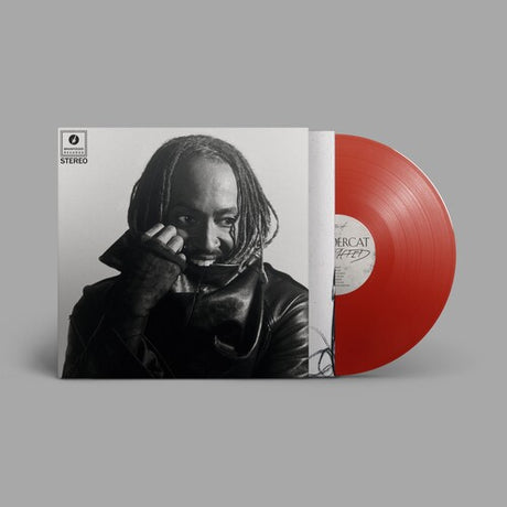Black and white album cover with a phote of Thundercat wearing a leather jacket and holding a phone to their ear, featuring Brainfeeder Music Records logo.