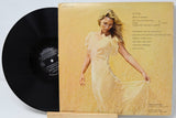 Back cover of Tiffany Bolling – Tiffany LP featuring track listing and artist in a wheat field
