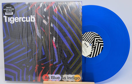 Front cover and blue vinyl of Tigercub's As Blue As Indigo album