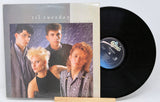 'Til Tuesday album cover with four band members and vinyl record on a white background