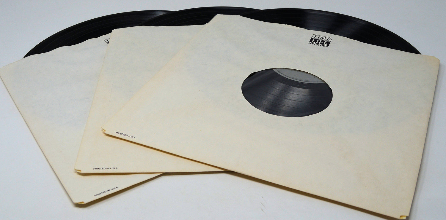 Three Time Life Records vinyl albums partially in original sleeves