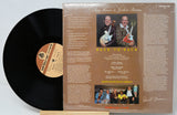 Back cover of Tiny Moore & Jethro Burns' Back to Back vinyl LP with tracklist and artist portraits