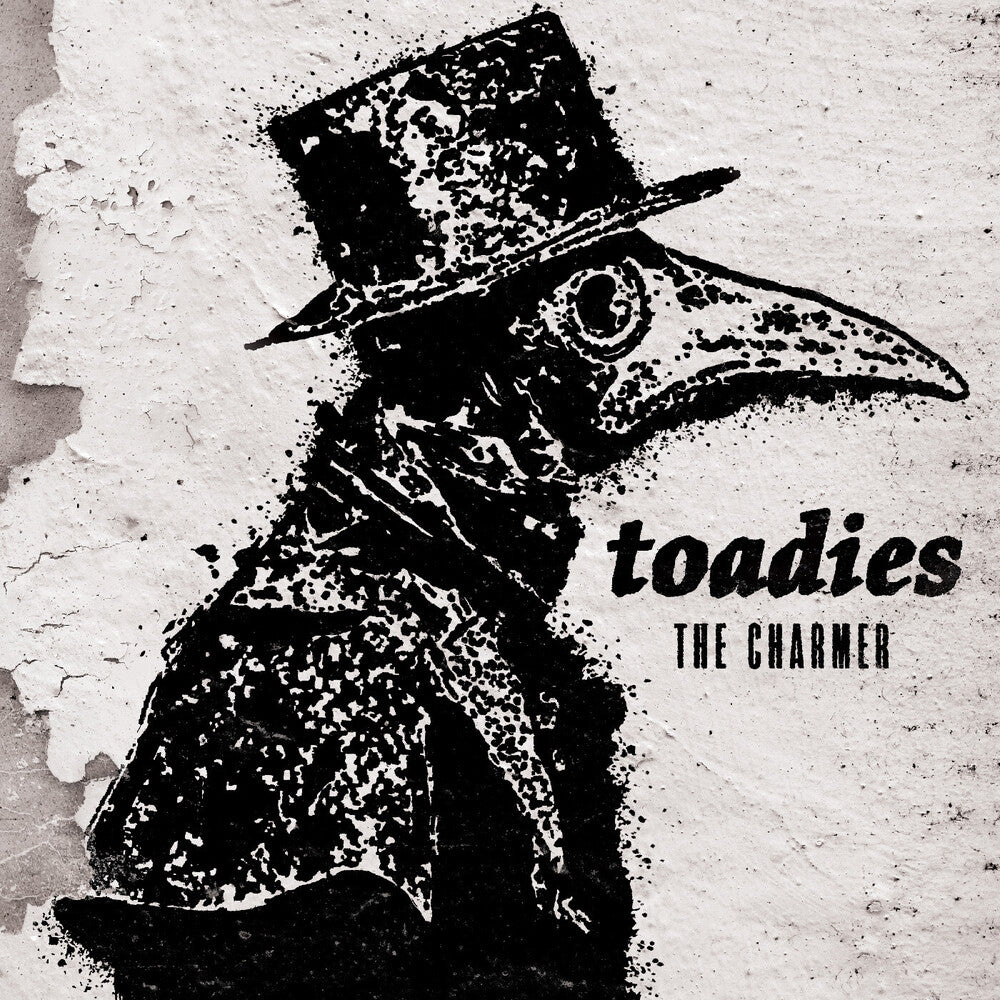 Black and white album cover with a masked bird figure and 'toadies' and 'The Charmer" text on a textured background.