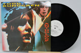 Vinyl record with a portrait on the cover and 'Munizier' label.