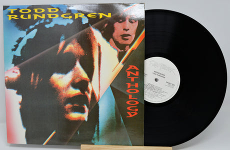 Vinyl record with a portrait on the cover and 'Munizier' label.
