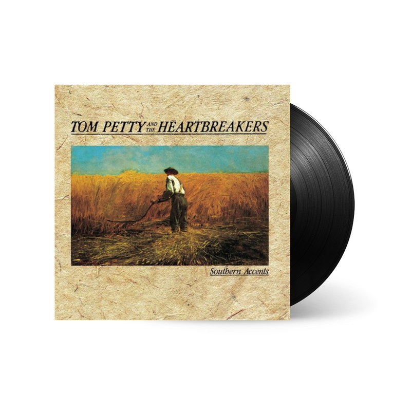 Vinyl record with cover featuring a person in a field and 'Tom Petty and the Heartbreakers' text.