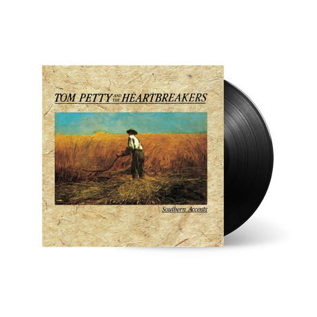 Vinyl record with cover featuring a person in a field and 'Tom Petty and the Heartbreakers' text.