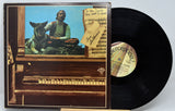 Front cover of Tom Sullivan's 'If You Could See What I Hear' vinyl LP with piano, sheet music, and dog