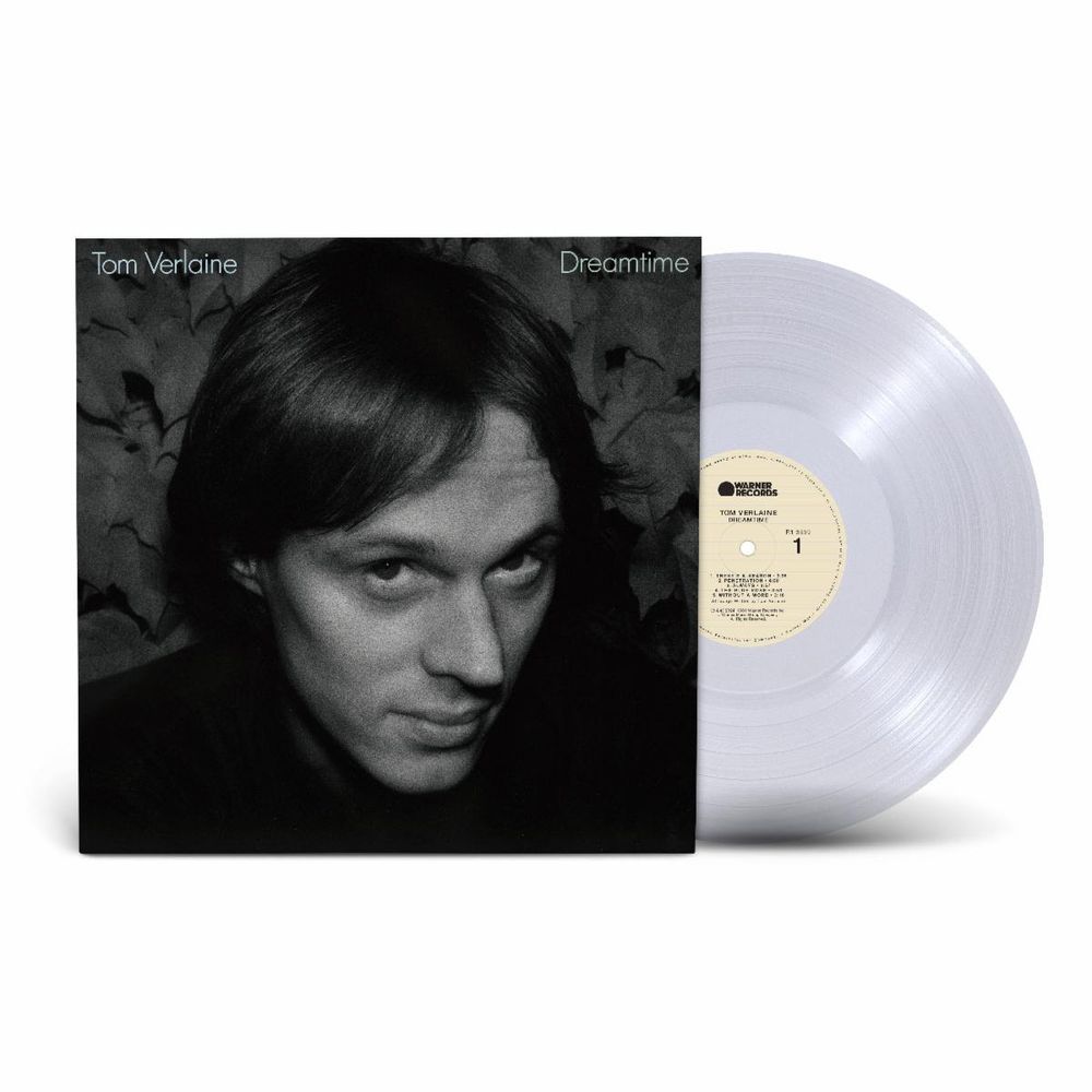 Tom Verlaine's 'Dreamtime' vinyl record album, featuring a black-and-white cover photo of the artist and a translucent clear record partially visible behind the sleeve.