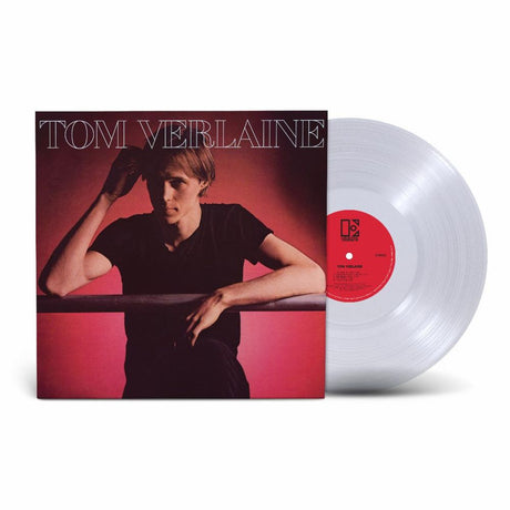 Tom Verlaine vinyl record album with the cover sleeve and a translucent clear record partially visible, photographed on a light gray background.