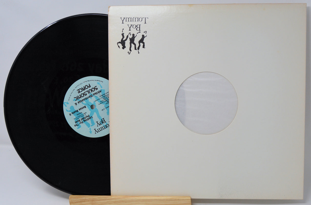 Tommy Boy Soulsonic Force vinyl record partially out of its white sleeve