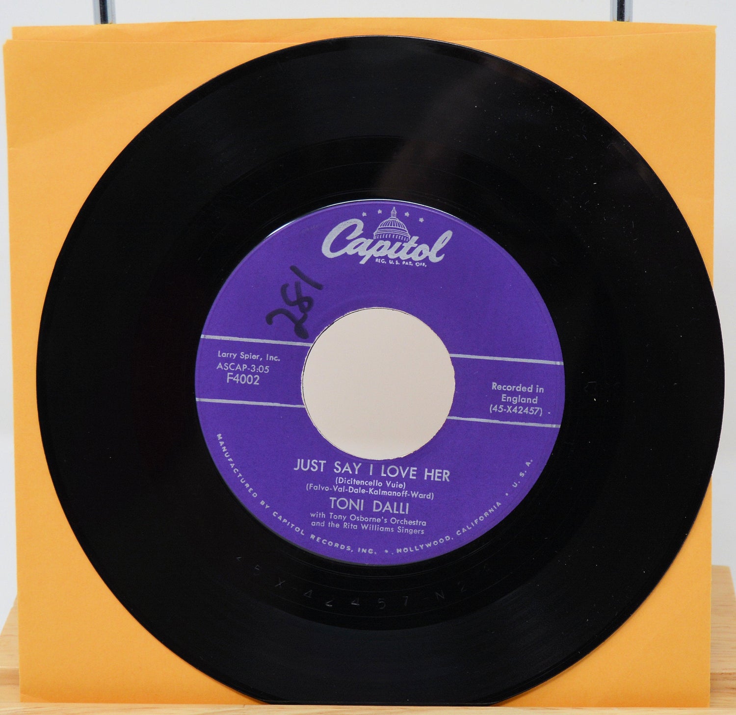 Vintage Capitol 45 record by Toni Dalli featuring Just Say I Love Her with a purple label