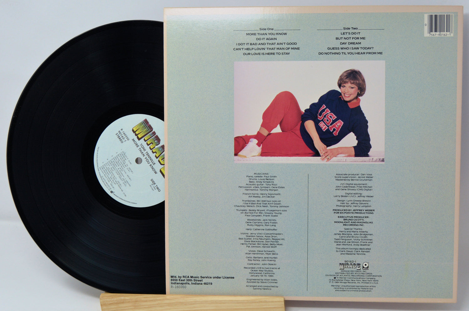 Back cover of Toni Tennille's 'More Than You Know' vinyl LP featuring tracklist and a photo of Toni in USA sweatshirt