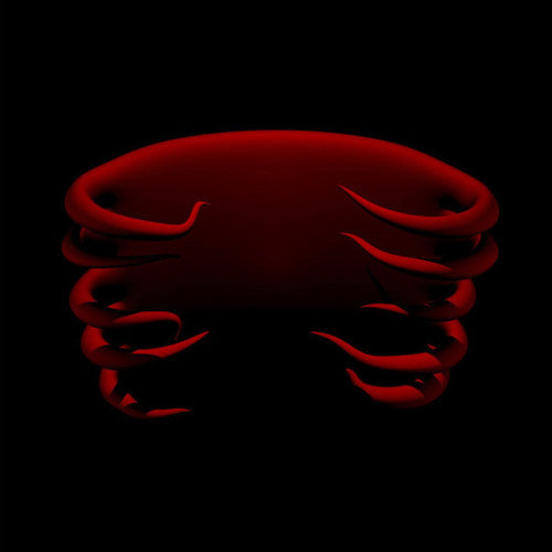 Red woven bracelet on a black background