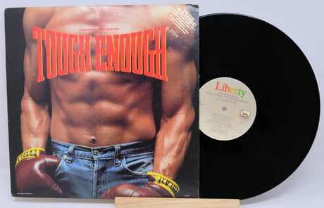 Front cover of Tough Enough soundtrack vinyl featuring a muscular boxer in jeans with gloves and bold title