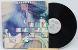 Front cover and vinyl record of Toure Kunda's Karadindi LP with artistic cover design and album logo