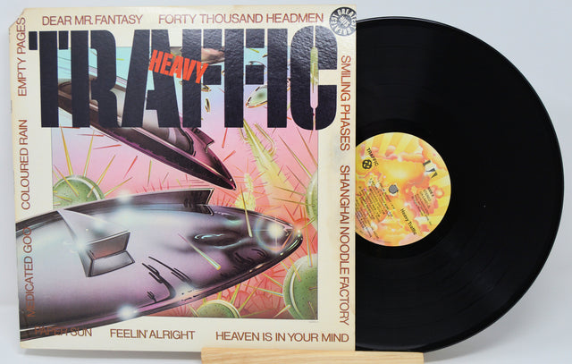Vinyl record with colorful cover featuring text and graphics on a white background