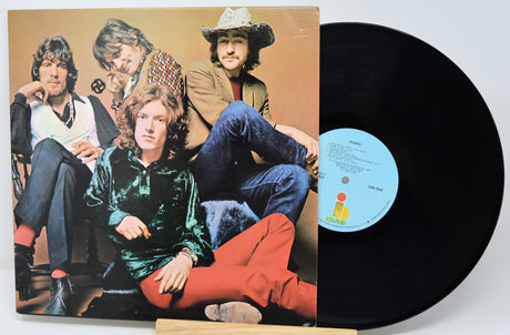 Vinyl record with cover featuring Tom Petty and the Heartbreakers on a white background