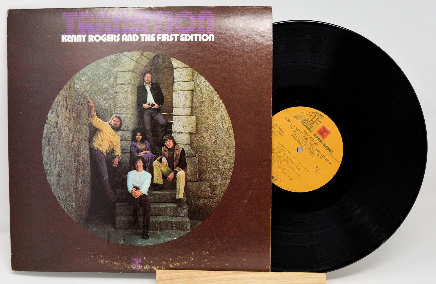 Front cover and record of Kenny Rogers And The First Edition Transition vinyl LP with band photo