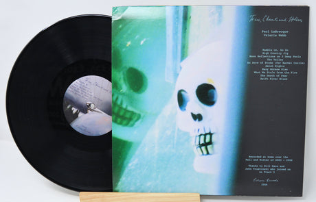 Front cover of 'Trees, Chants and Hollers' vinyl record by Paul LaBrecque & Valerie Webb featuring a blue skull image