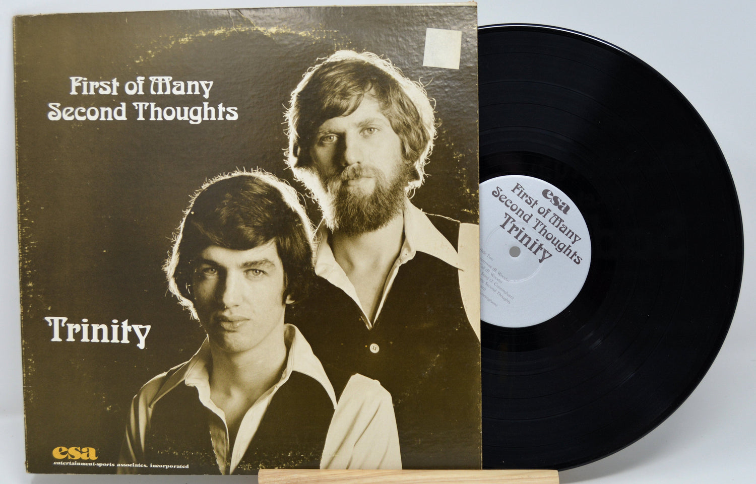 Front cover of Trinity's 'First of Many Second Thoughts' vinyl LP showing band members