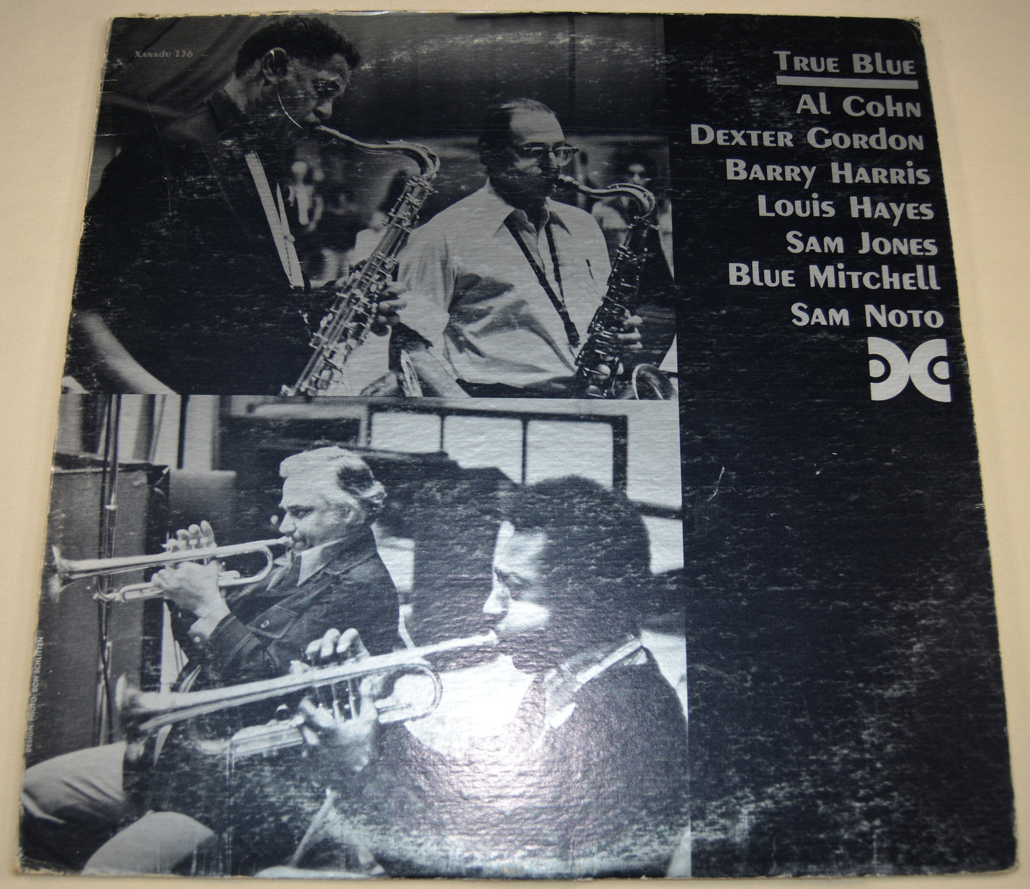 Front cover of True Blue album featuring musicians playing jazz instruments