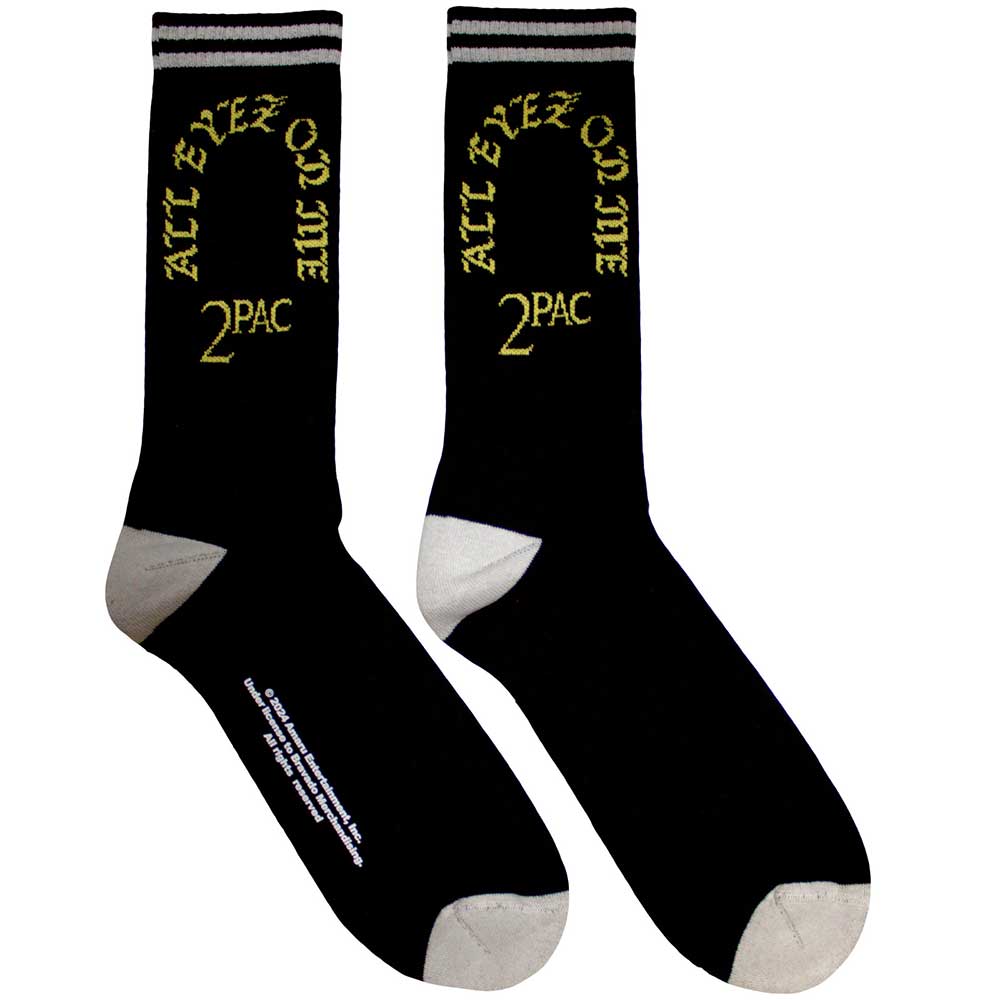 A pair of black Tupac All Eyez On Me socks with the text design motif spread out on the foot area.