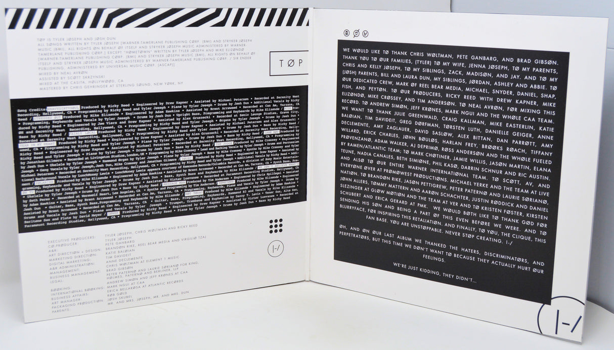 Vinyl record with its cover displaying text and branding.