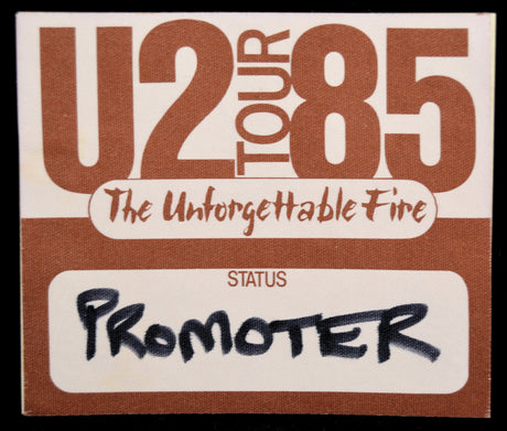 Backstage Pass for U2 Tour 85 with 'The Unforgettable Fire' and 'Promoter' text.