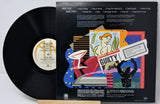Vinyl record with colorful cover featuring a graphic design and text.