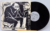 Vinyl record with cover featuring a stylized illustration of a person and text.