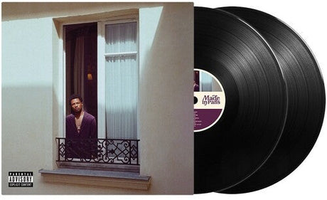 Double vinyl album featuring an artist looking out of a window with an elegant iron balcony