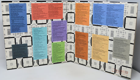 Colorful posters on a geometric-patterned board