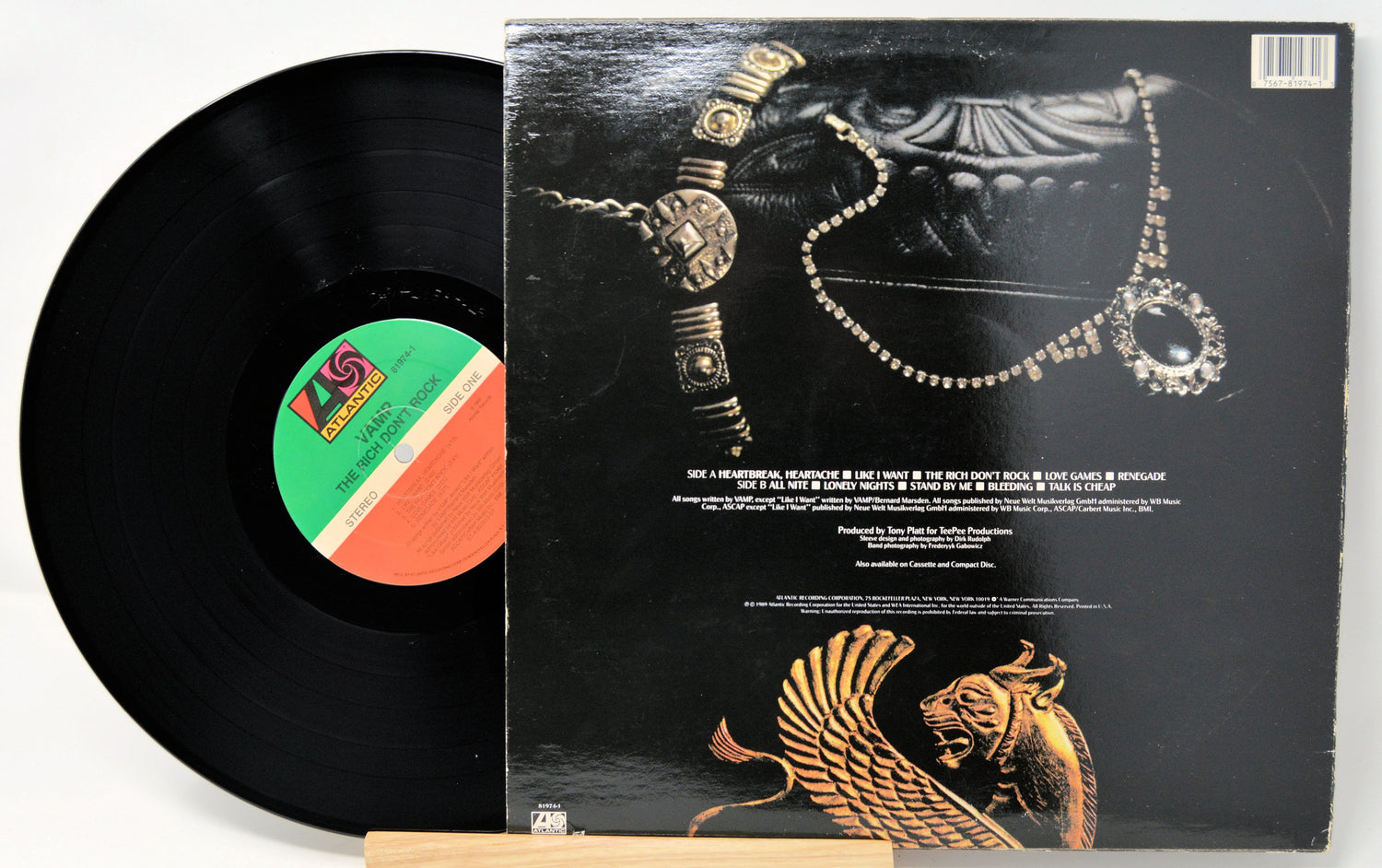 Vinyl record with a detailed cover featuring jewelry designs.