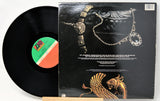 Vinyl record with a detailed cover featuring jewelry designs.