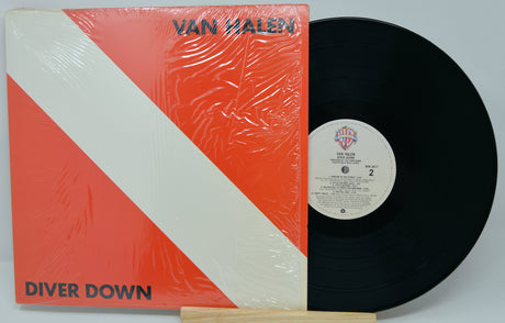 Van Halen 'Diver Down' vinyl record and cover on a white background