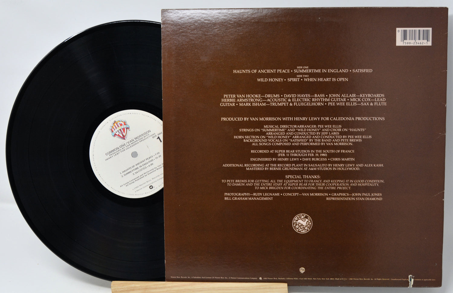 Vinyl record with a brown label on a white background