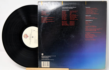 Vinyl record with cover displaying text on a white background