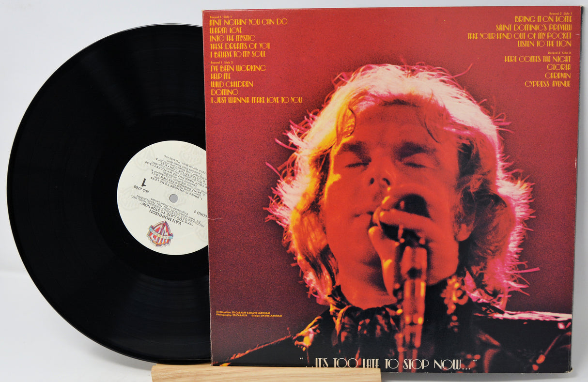 Vinyl record with a cover featuring a person singing, on a white background
