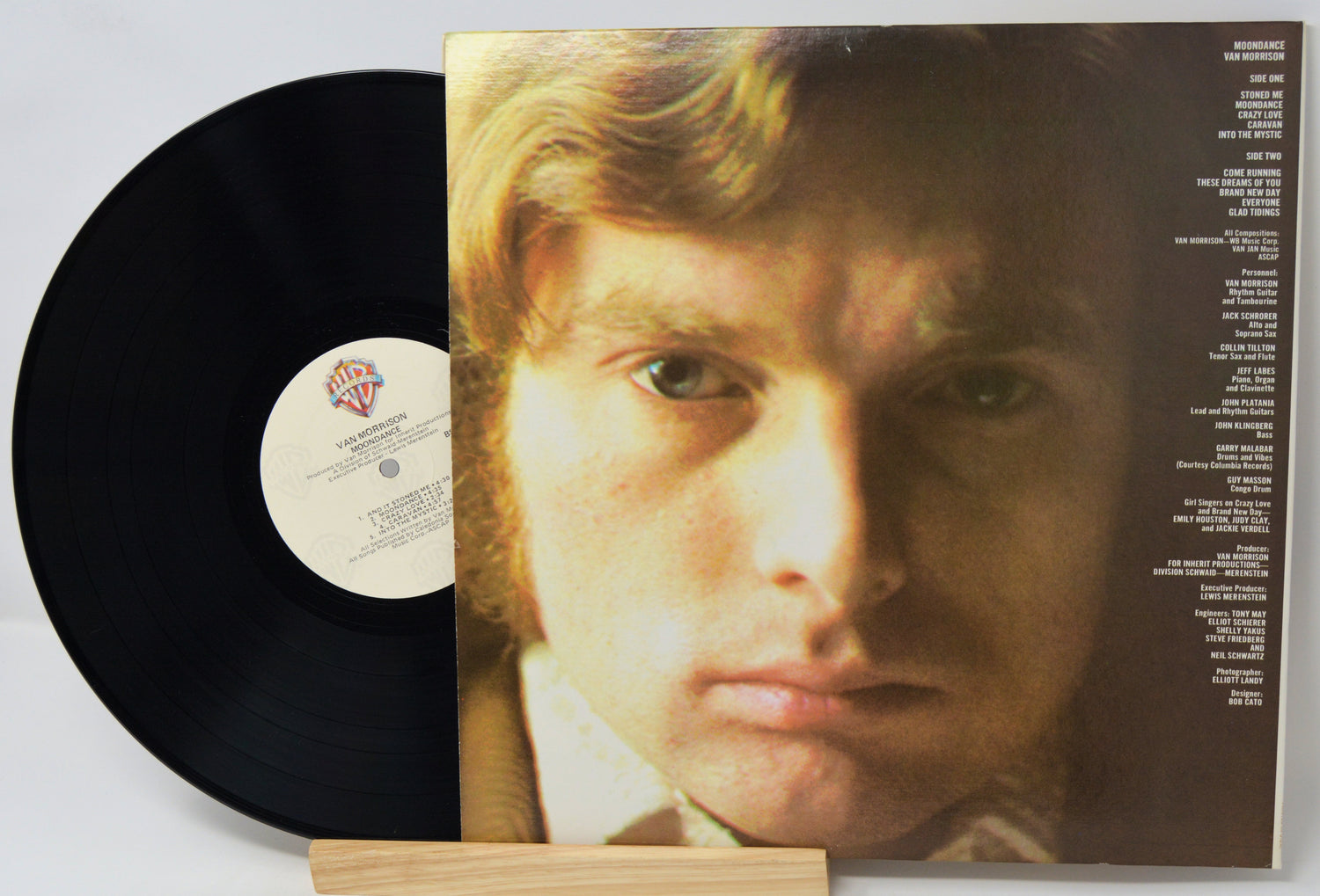 Vinyl record with a portrait on the cover against a white background