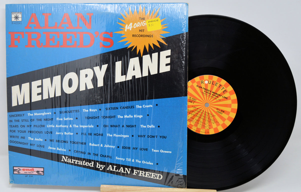 Vinyl record and cover titled 'Alan Freed's Memory Lane' on a white background