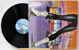 Vinyl record with a colorful cover featuring a person on roller skates.