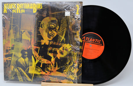 Vinyl record with cover featuring a stylized illustration of a man and text on a white background