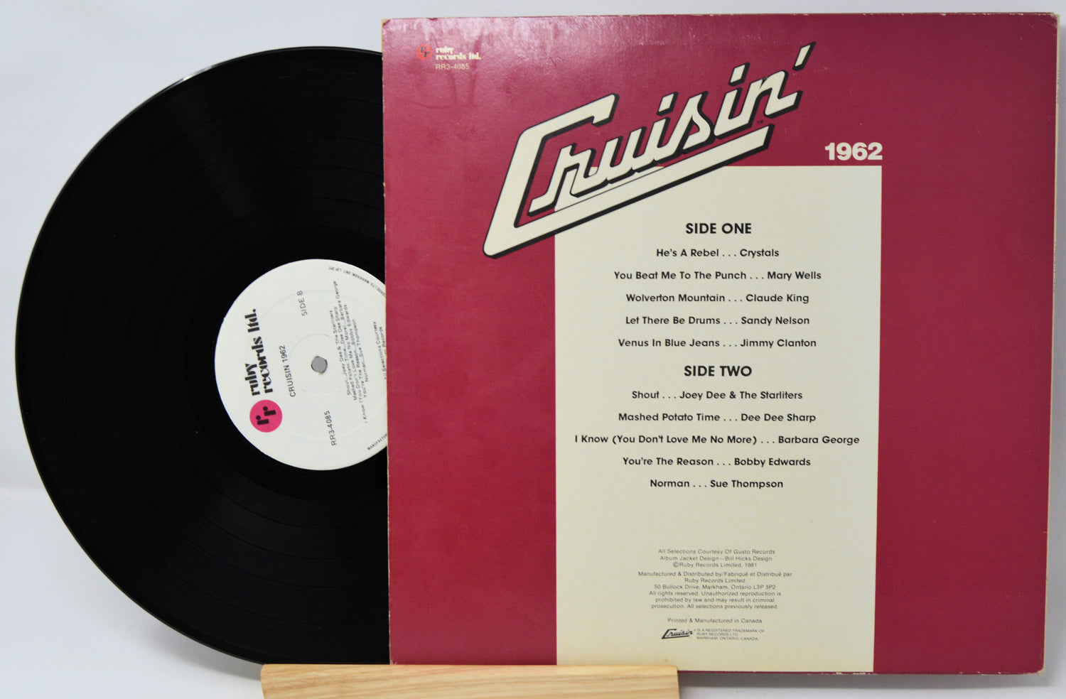 Vinyl record with red cover featuring 'Cruisin' 1962' text and tracklist.