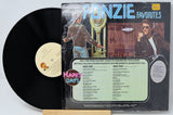 Vinyl record with cover featuring 'The Fonz' from 'Happy Days' on a white background