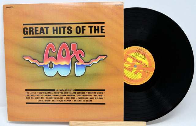 Vinyl record with cover titled 'Great Hits of the 60's' on a light blue background