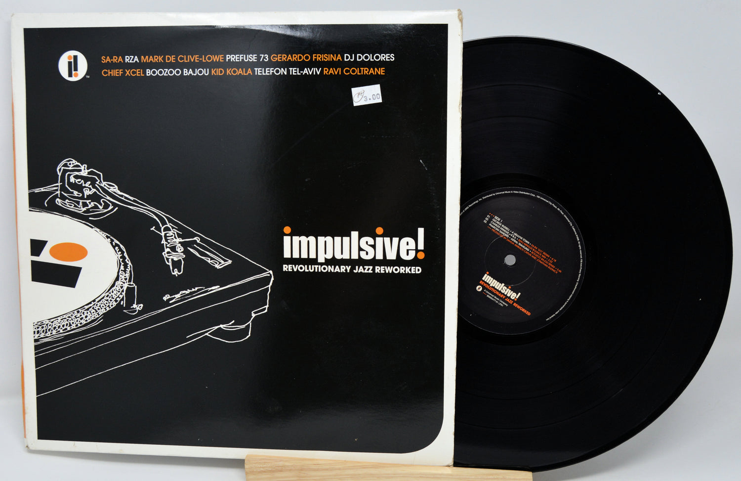 Vinyl record with a turntable illustration on the cover and 'impulsive!' branding.