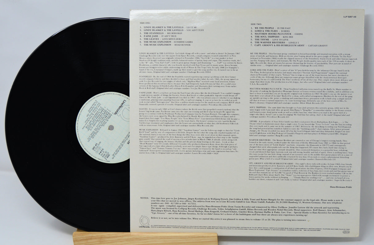 Vinyl record with text on a white background